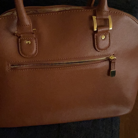 Camel color purse never used, it has several compartments inside. - Picture 2 of 4